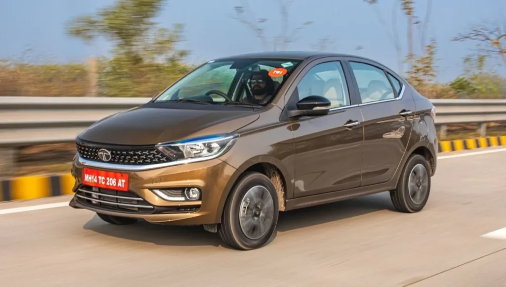 Tata Tiago: बजट में उपलब्ध स्टाइलिश हचबैक, शानदार फीचर्स और भरोसेमंद सुरक्षा